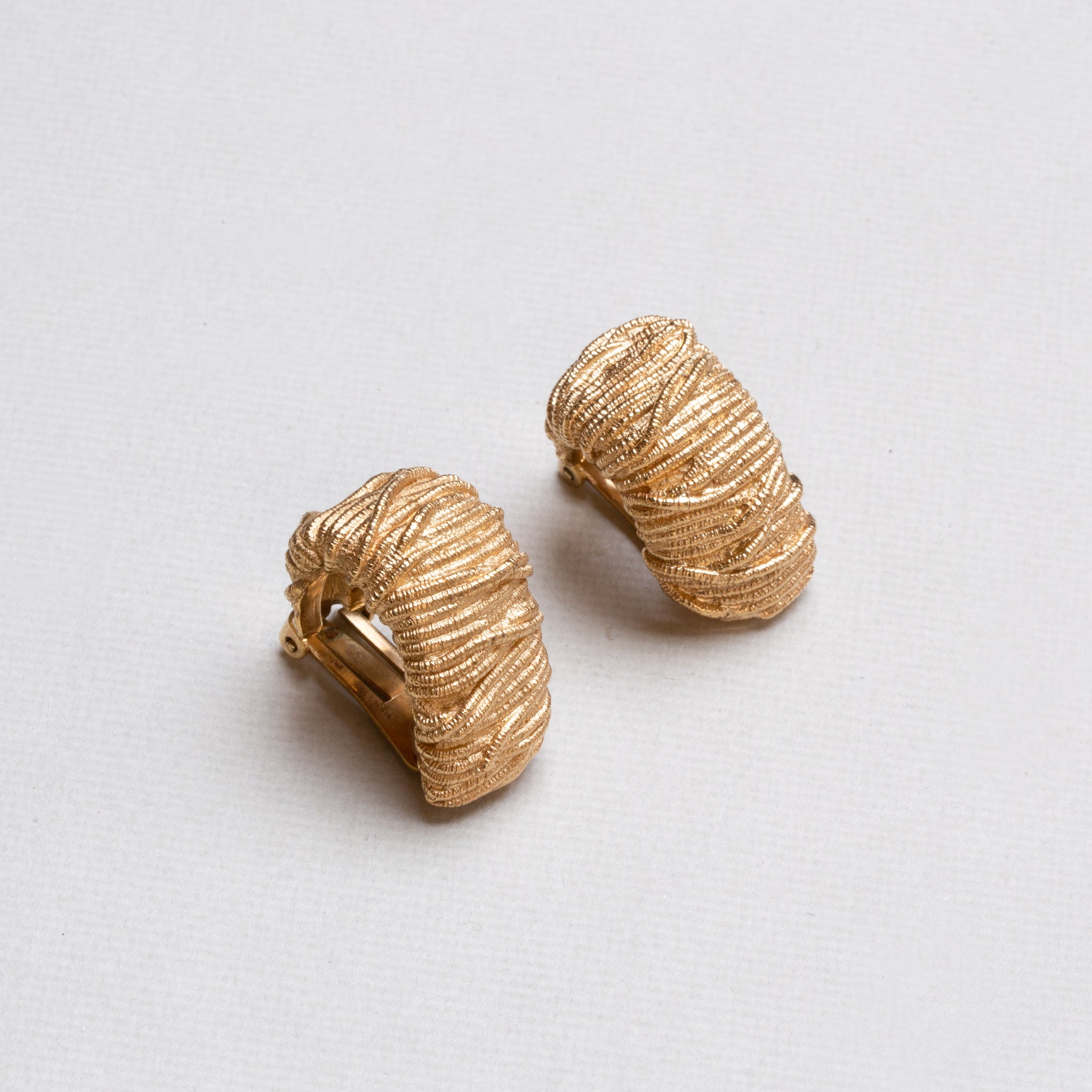 Vintage Christian Dior Textured Gold Clip-on Earrings felt
