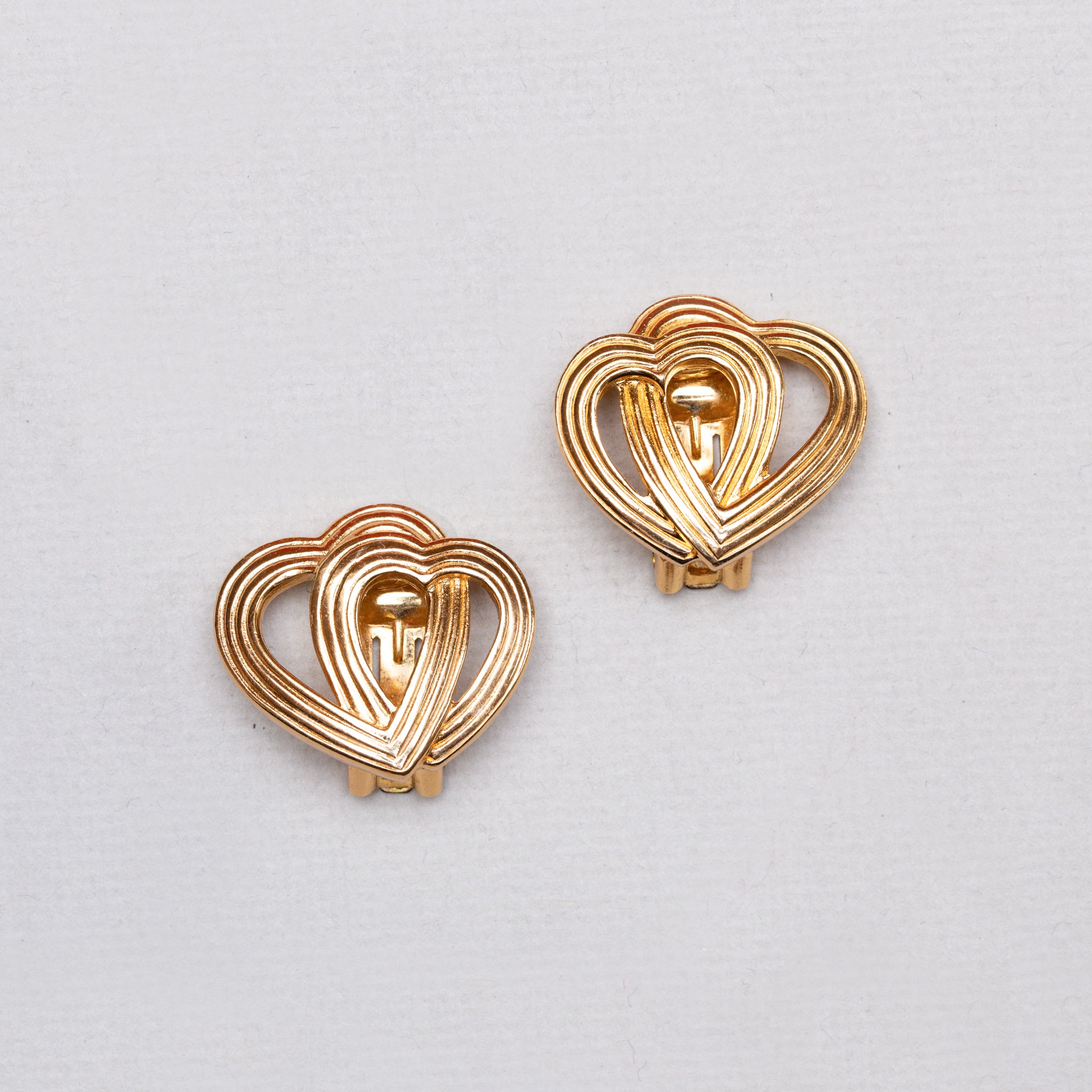 Vintage Christian Dior Lined Gold Heart Clip-on Earrings felt