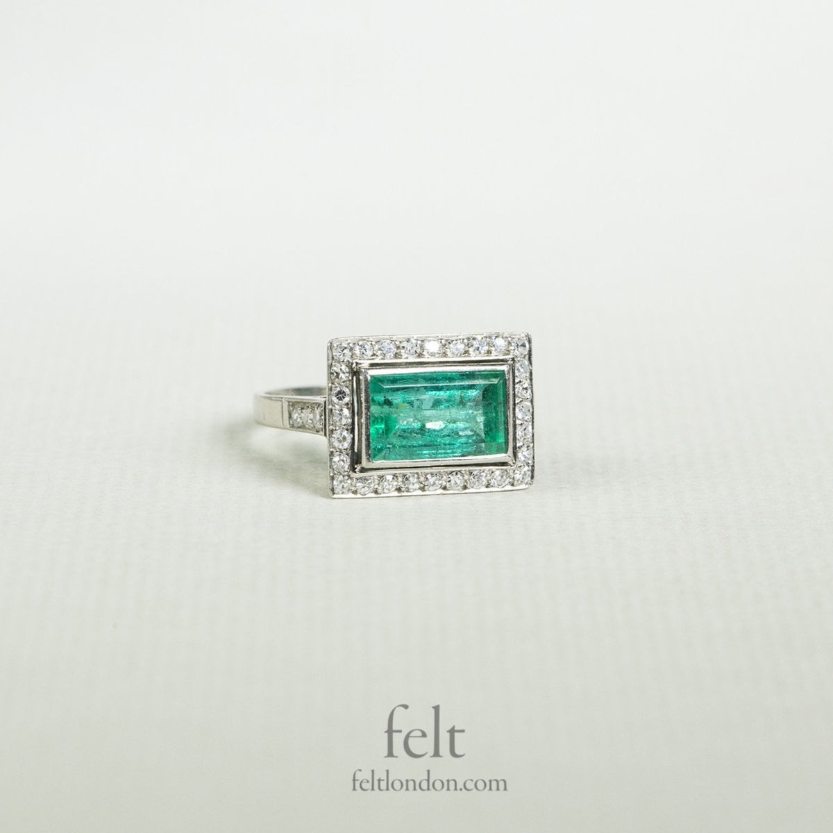 incredible colour and shine of the diamonds and the fantastic emerald