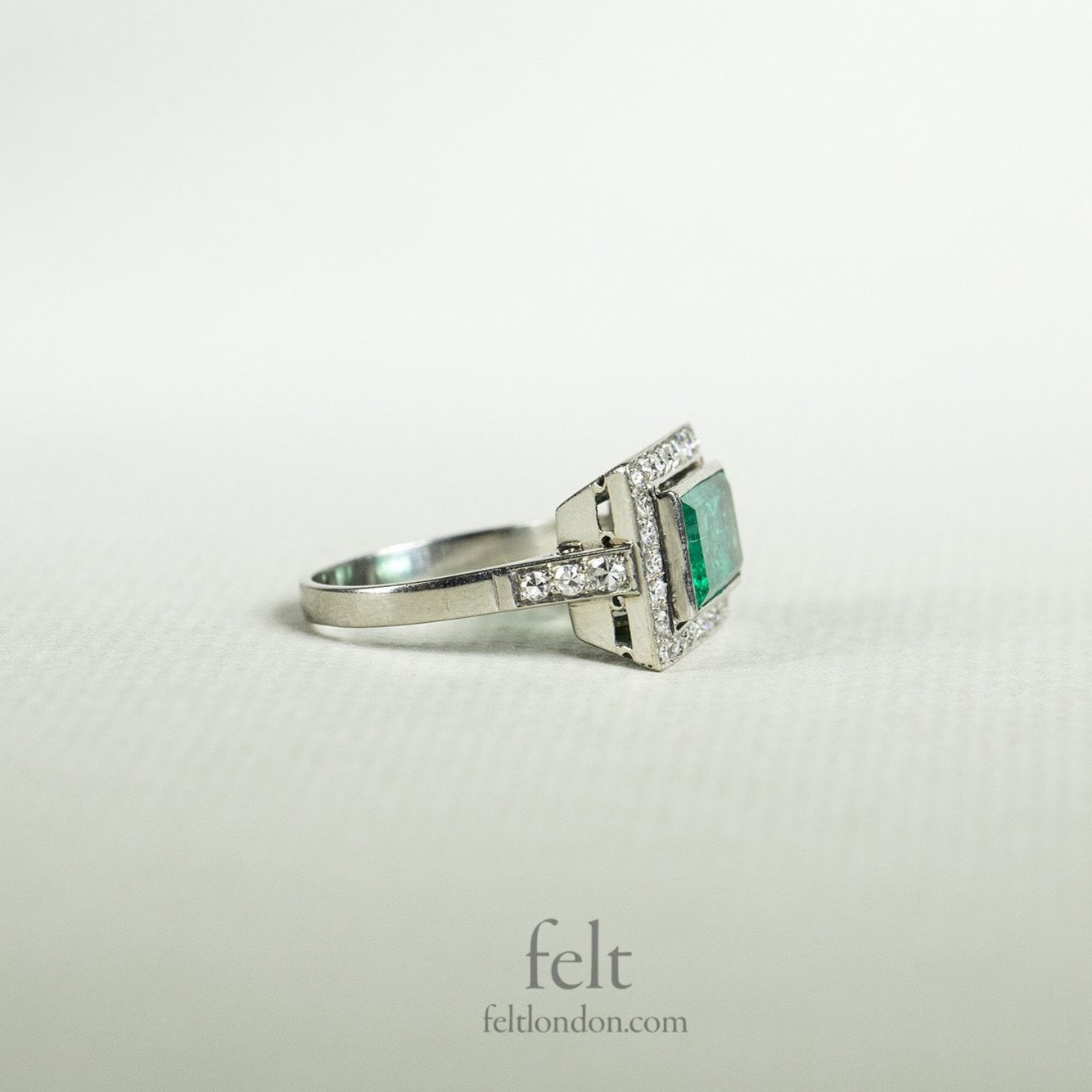 incredible colour and shine of the diamonds and the fantastic emerald