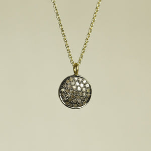 the disc on a chain - we sell the necklace on two different lenghts