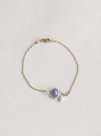 Claire van Holthe Tanzanite eye bracelet with pearl