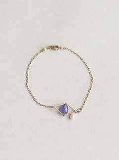 Claire van Holthe Tanzanite eye bracelet with pearl