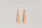 art deco inspired orange shell and freshwater pearl drop earrings