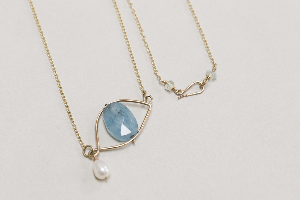 the fastening detail - the hook includes two decorative tiny aquamarine beads
