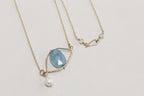 the fastening detail - the hook includes two decorative tiny aquamarine beads