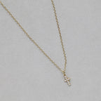 felt tiny diamond cross in yellow or white gold setting