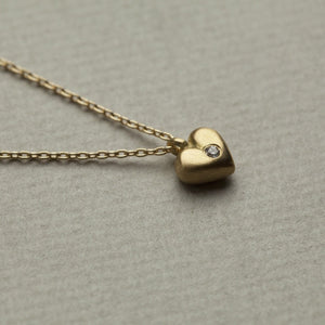 curvy heart pendant with diamond