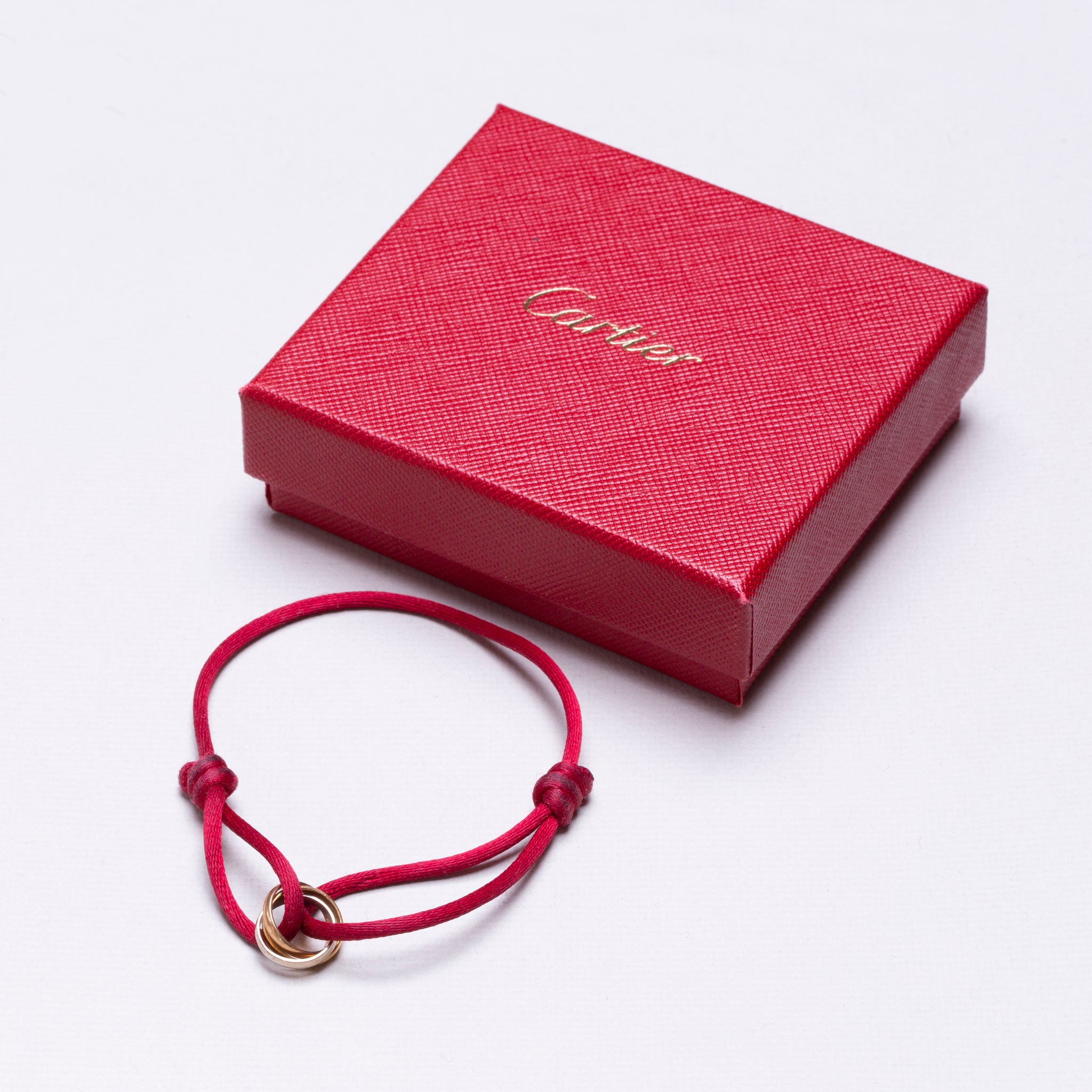 Cartier Trinity Gold Bangle Bracelet – Opulent Jewelers