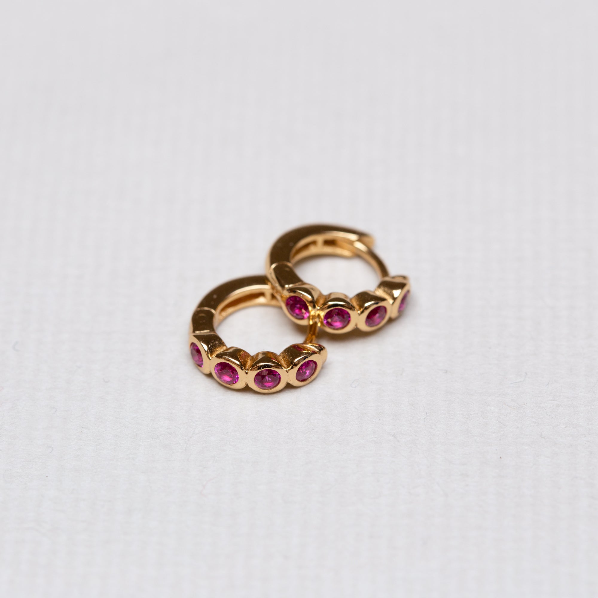 Gold Huggie Earrings with Ruby Pink Stone