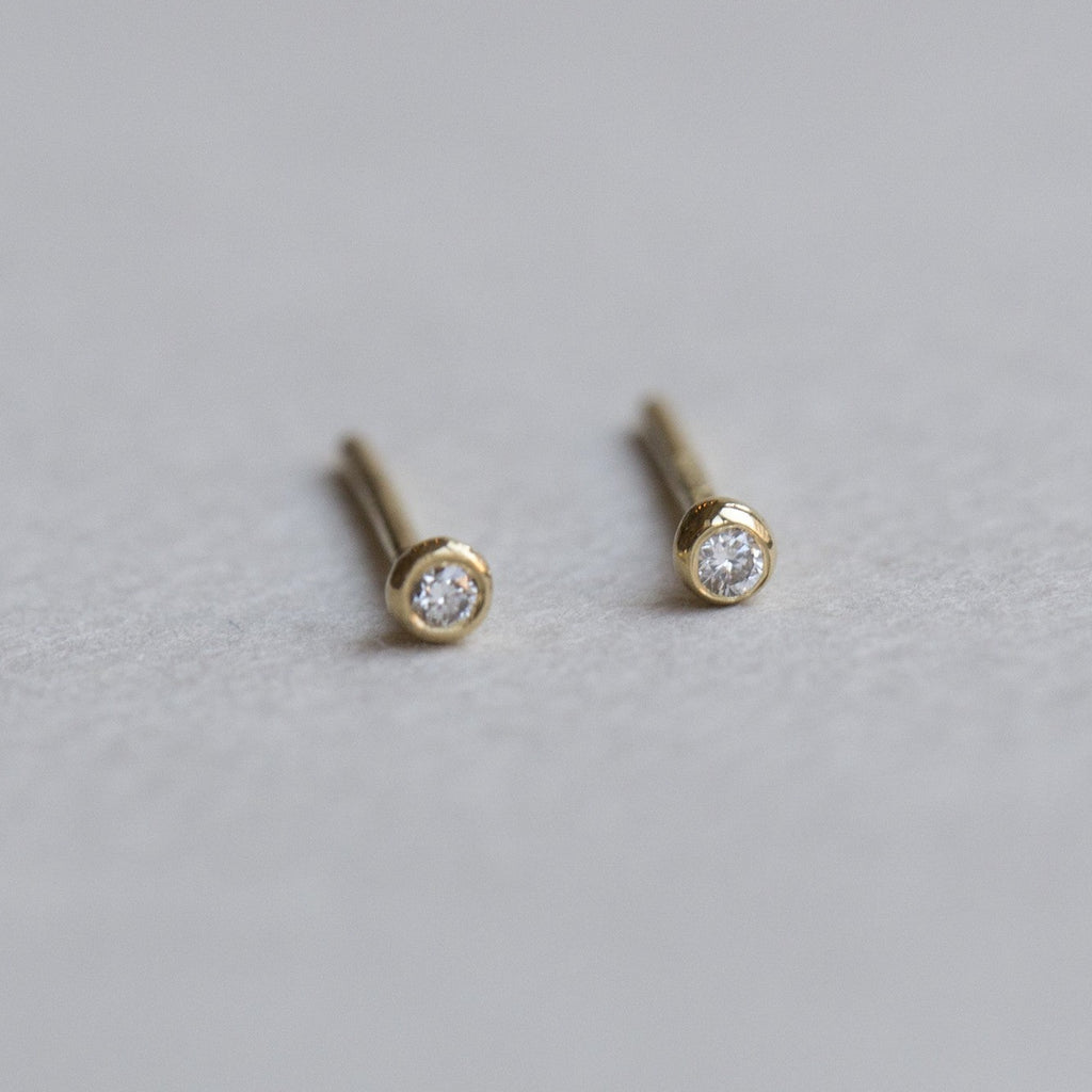 felt diamond blob stud earrings close up 