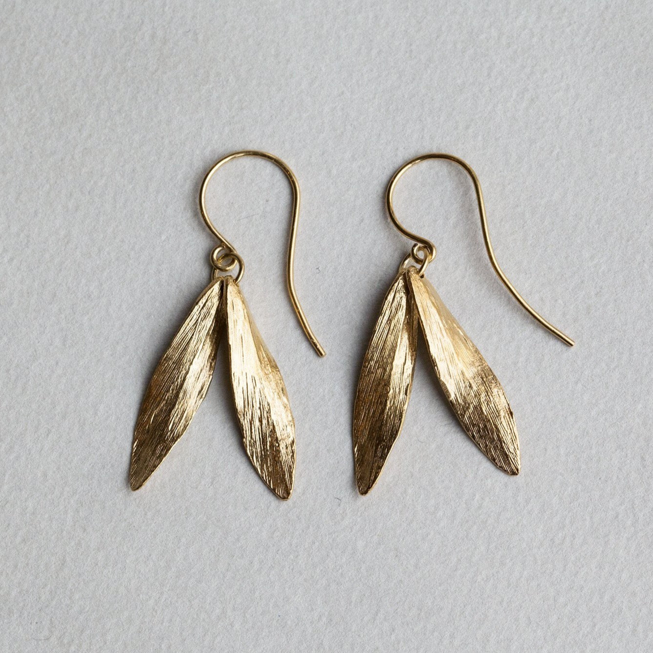 Catherine Zoraida double leaf gold plated hook earrings