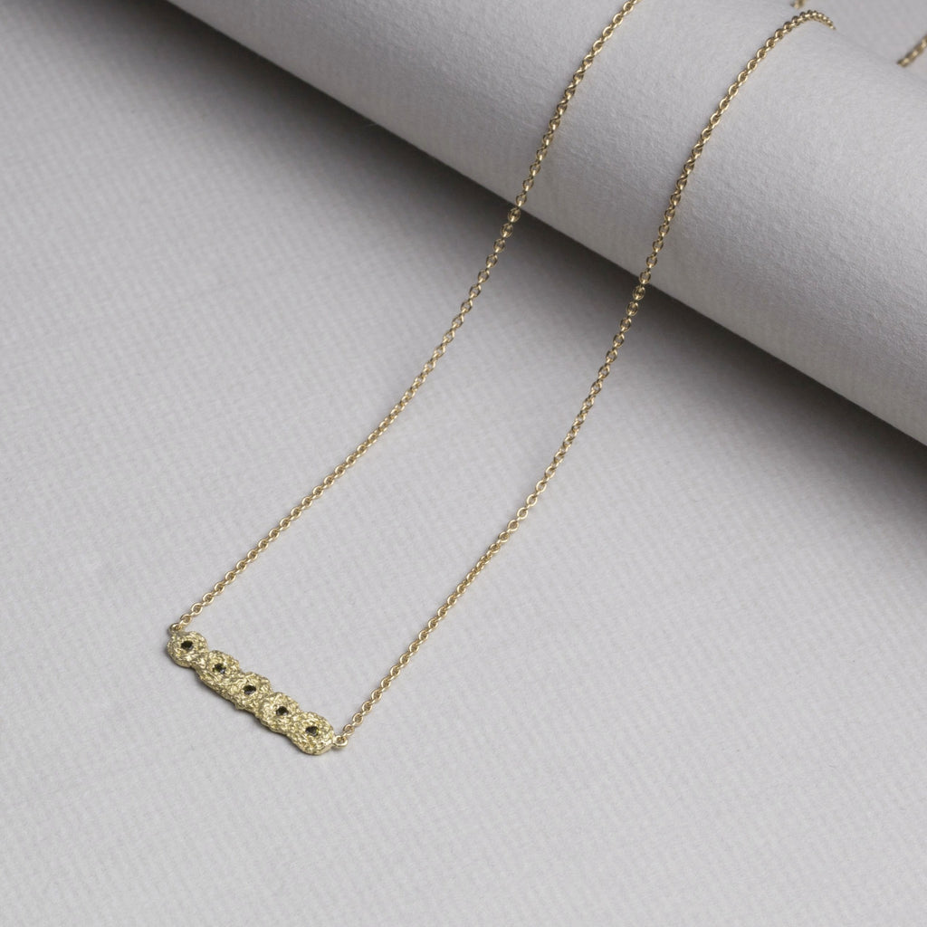 A matching necklace available at felt