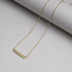 A matching necklace available at felt