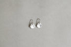hammered silver disc hook earrings are our bestselling silver earrings also by Karen Hallam