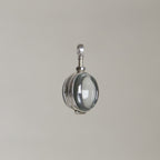 the intriguing mechanism of the glass cabochon locket from up close
