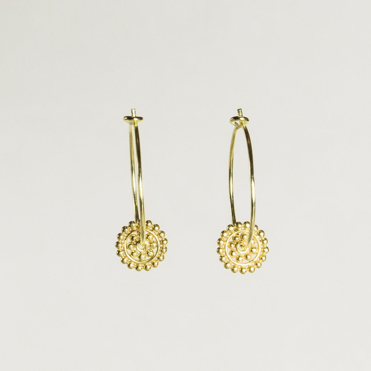 a copy of Roman antique earrings, theses dotted circles are a fantastic addition to a simple hoop