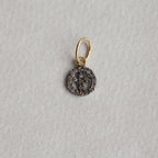 a tiny peace sign from the same collection also available at feltlondon.com