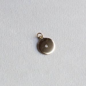 a diamond version of the same charm - also available at feltondon.com as a necklace or on its own