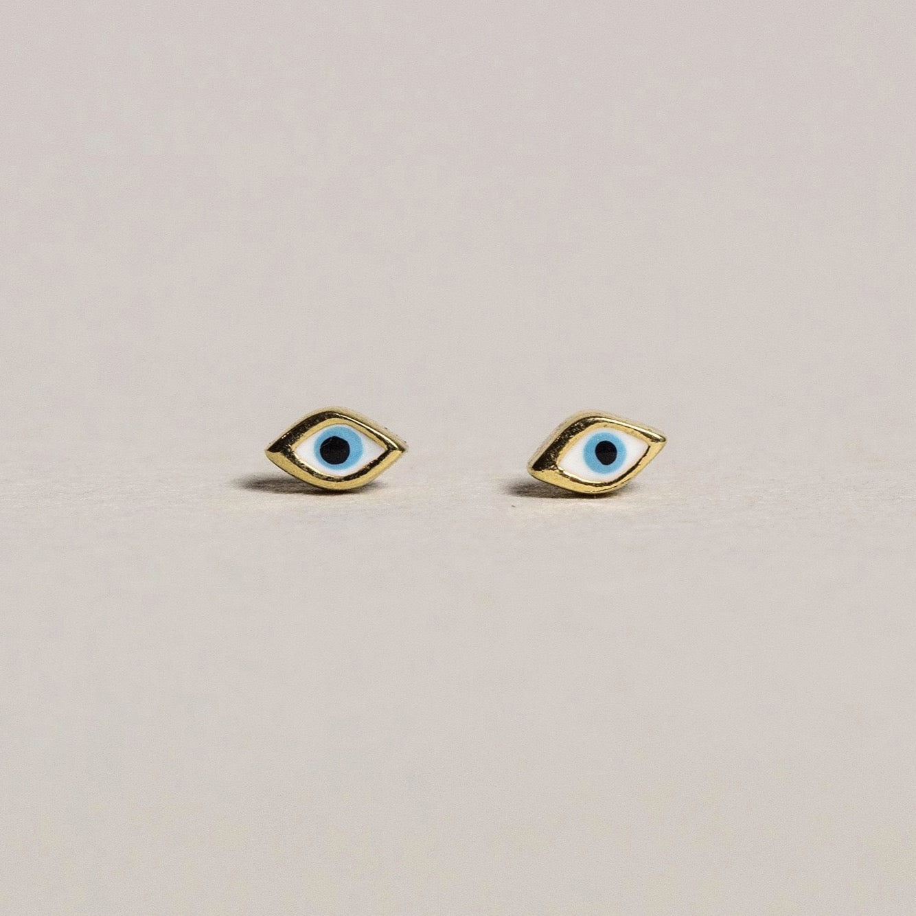 fantastic 'evil eye' micro studs brilliant for multi-pierced! 