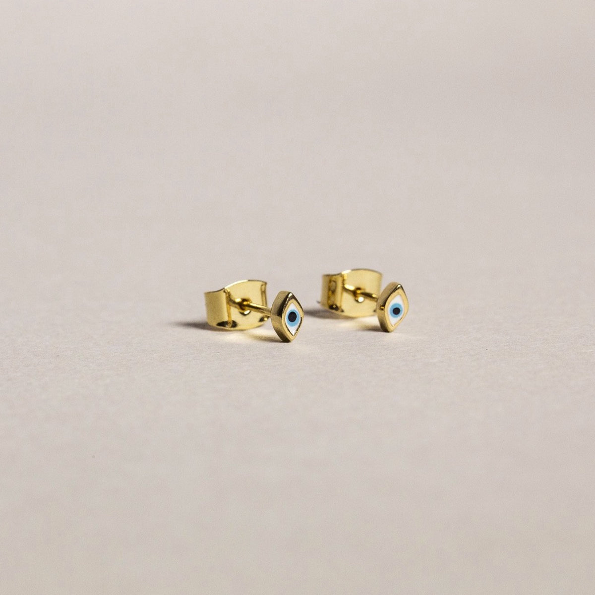made of gold plated sterling silver, the studs are super cute size (picture with butterflies for comparison)