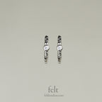front view of "Single Stone Sleepers" in sterling silver