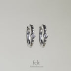 Single stone sleepers in sterling silver with a single cubic zirconia 