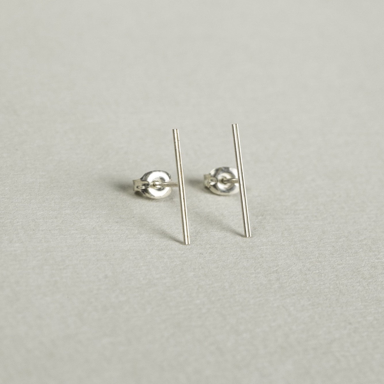 silver double line studs are perfect earrings for those who like understated look
