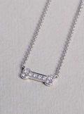 Dog bone white gold diamond necklace