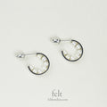 astonishing, pearl lined silver hoops from e.m. Mehem
