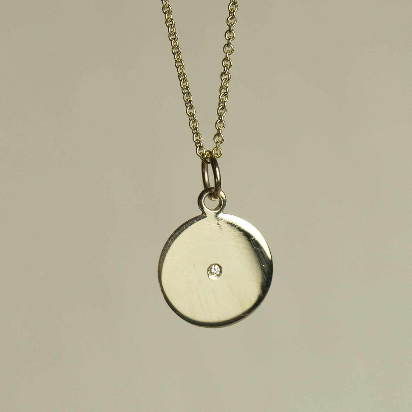 Gold and Diamond Disc Necklace felt - Main Image