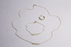 A matching set - necklace, bracelet and hoops