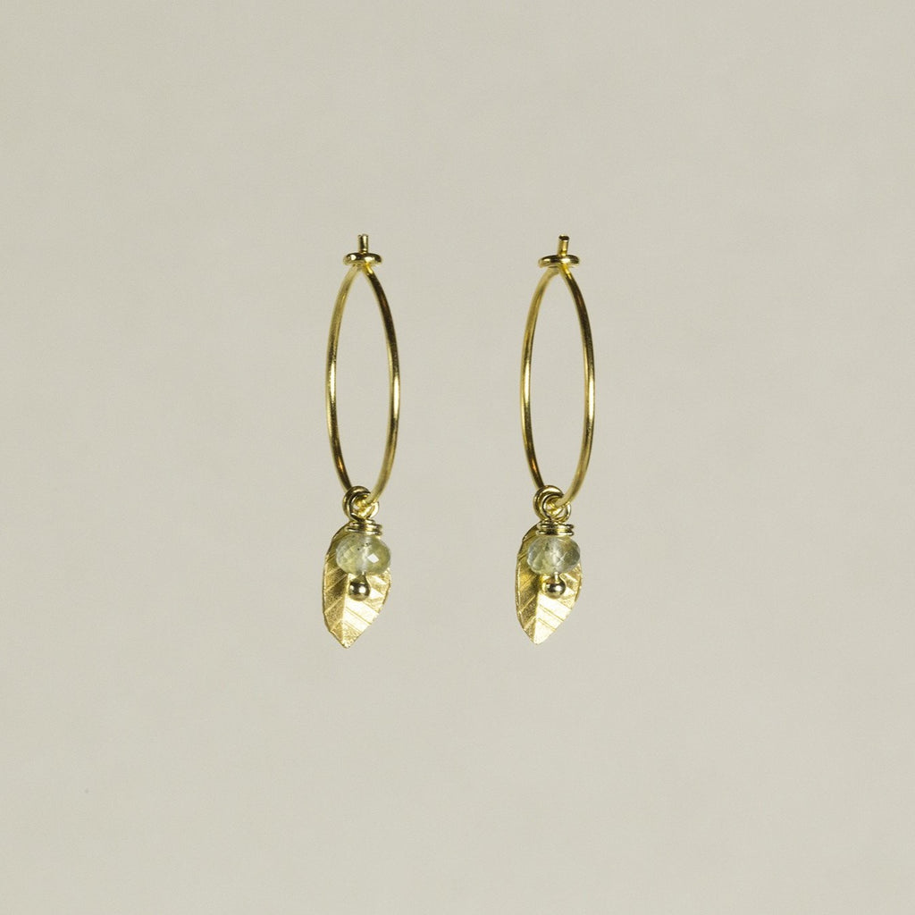 adorable leaf charm hoops with delicately iridescent aquamarine beads, also available at feltlondon.com