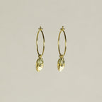 adorable leaf charm hoops with delicately iridescent aquamarine beads, also available at feltlondon.com