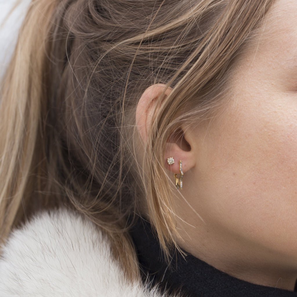 Worn with a simple diamond stud