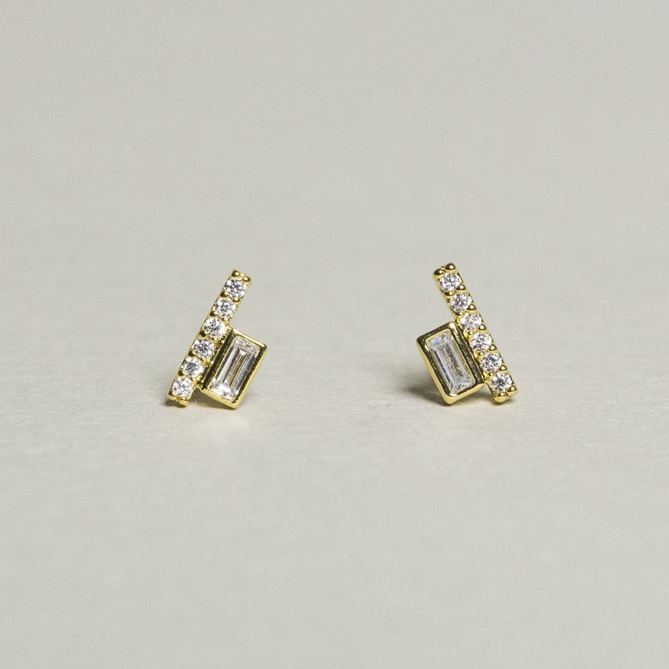 quirky yet elegant baguette rectangular and brilliant cut line studs