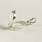 opened oval locket seen from the side - same screw design is used in the round lockets